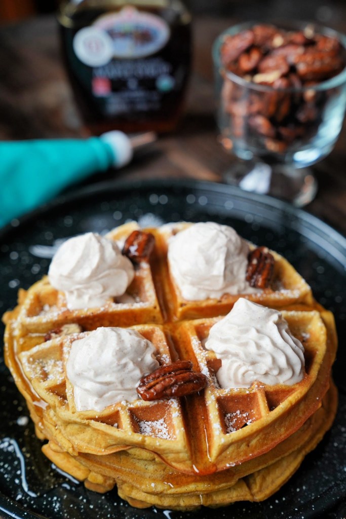 Sweet Potato Spiced Waffles with Maple Cinnamon Whipped Cream and Candied Pecans